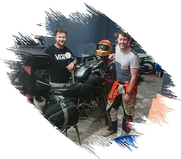 Two men with adventure motorcycle
